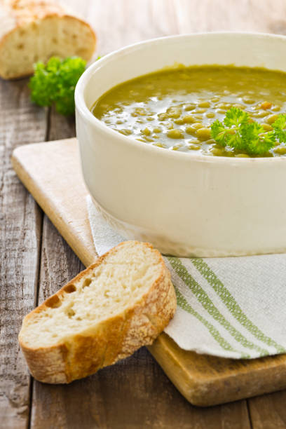 istock Fresh homemade pea soup with bread 836505588