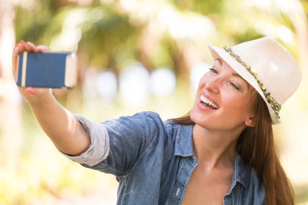 istock Selfies in the park 836507840