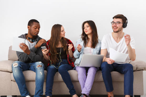 istock Young diverse people listen to music with gadgets 836518460