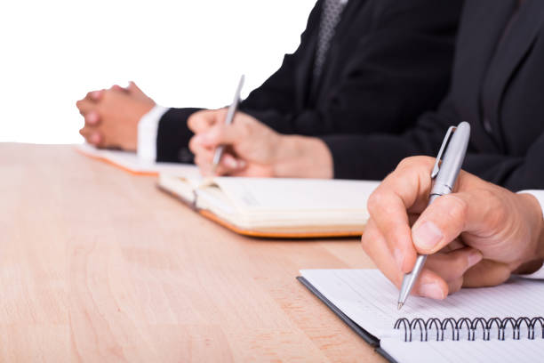 istock Businessman and Businesswoman take note 836522322