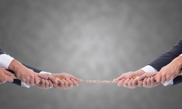 istock Tug of war business 836527888