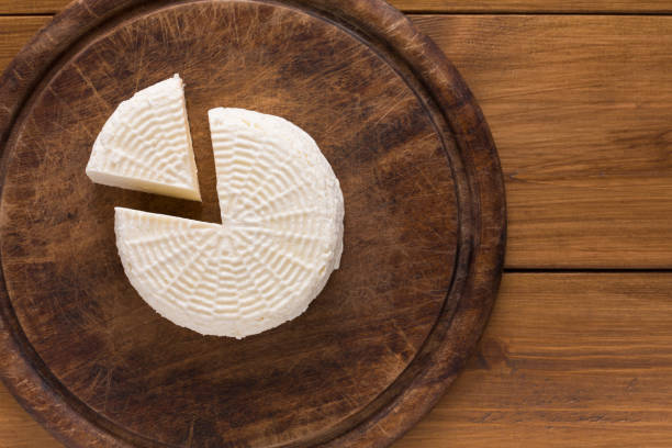 Cheese wheel, homemade indian paneer top view