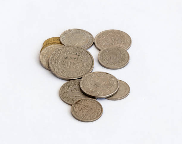 istock Several Swiss coins of different value isolated on a white  background 836531072
