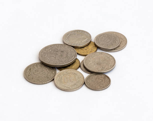 istock Several Swiss coins of different value isolated on a white  background 836531292