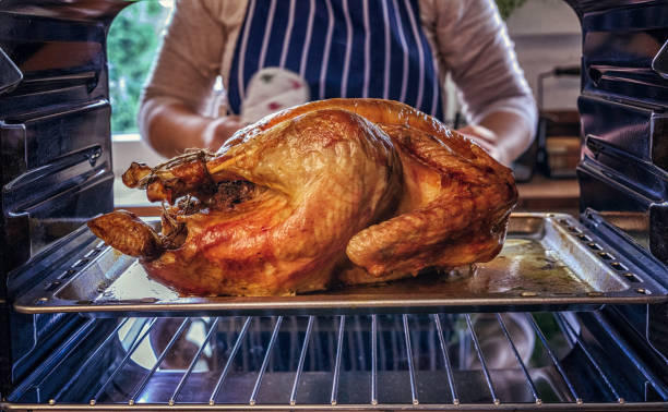 istock Turkey Roasting in the Oven 836531710
