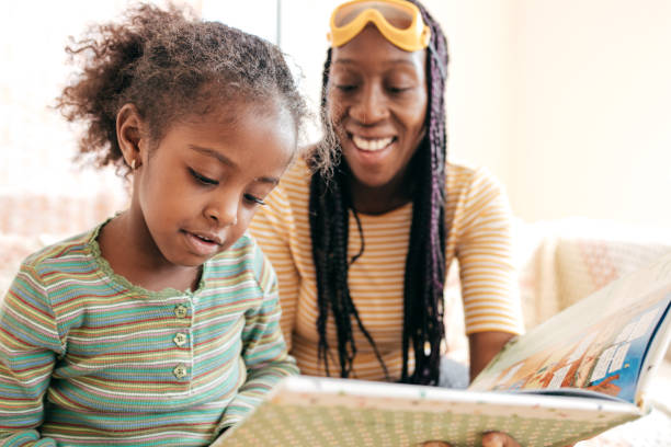 istock Mom and daughter reading a book 836532088