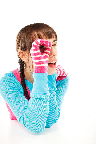 woman peering through hand in shape of telescope - 11193 - fotografias e filmes do acervo