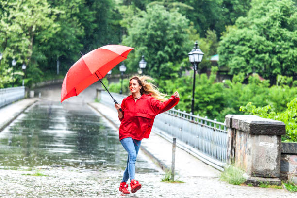 istock Beautiful girl with umbrella 836534928