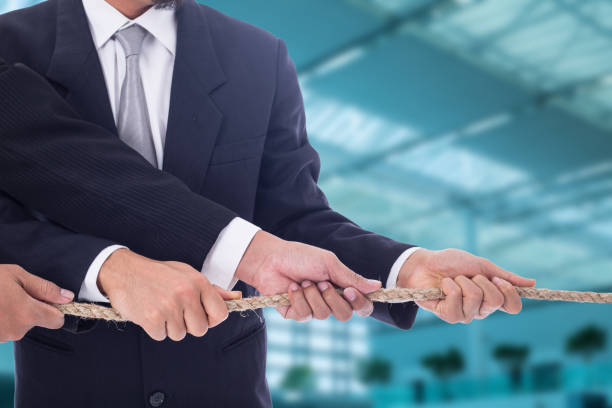 istock Tug of war business , 836544600
