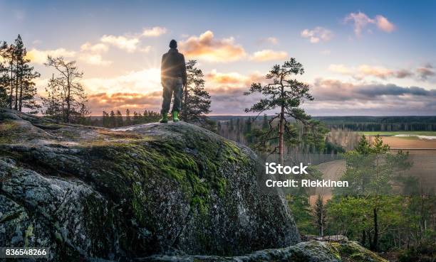 Hiker Standing Front Of Beautiful Landscape At Early Morning Stock Photo - Download Image Now
