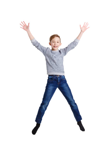 istock Happy laughing boy jumping on white isolated background 836548440