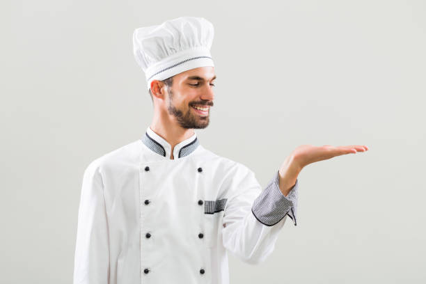 istock Chef showing palm of hand 836548462