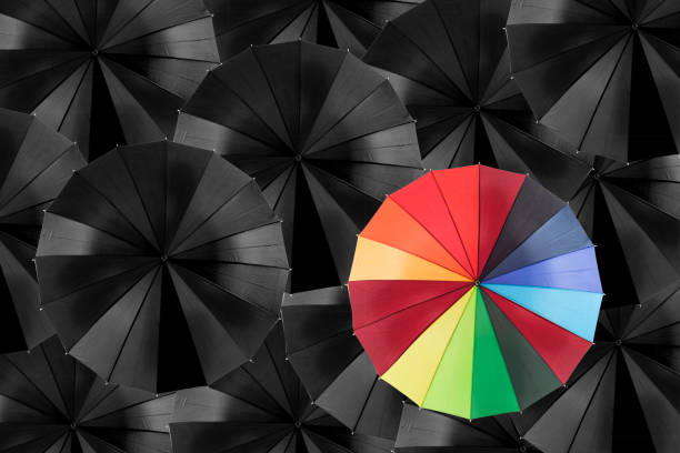 istock Holding colorful umbrella for saving money. 836548890