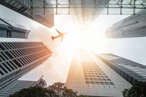 istock Airplane flight over city building 836548976