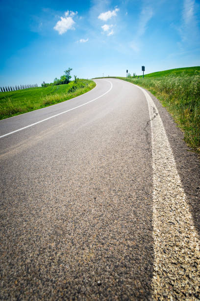 istock Asphalt road in Tuscany, Italy 836554488