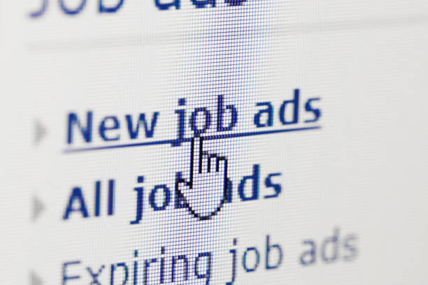 looking for new job on internet ads - job listing imagens e fotografias de stock