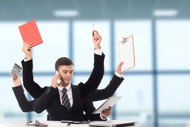 Multitasking man busy business manager task with white background.