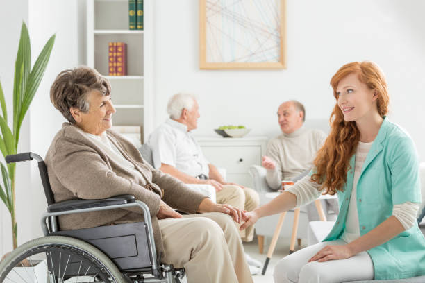 istock Nurse talking to lady 836559360
