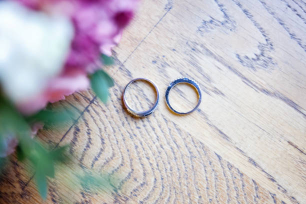 istock Wedding rings and bouquet 836559660