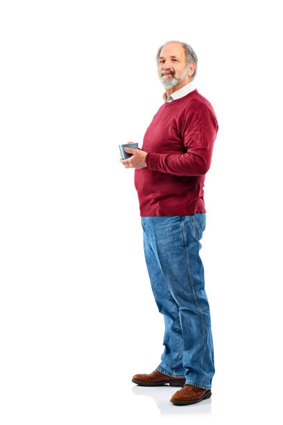 istock Handsome senior man with cup of coffee 836562798