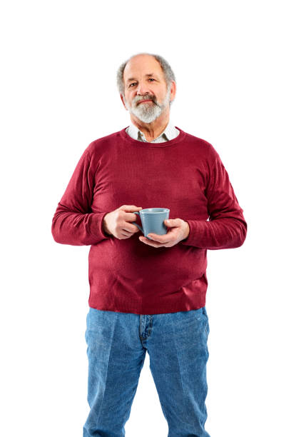 istock Relaxed senior man with cup of coffee against white 836562818