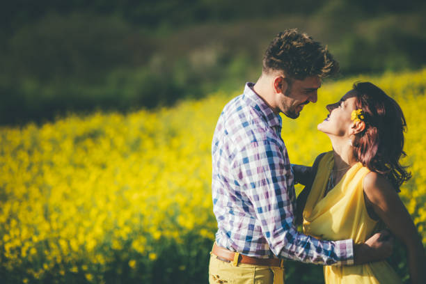 istock Loving couple have fun at meadow 836562866