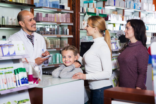 istock Smiling girl in a pharmacy 836563234