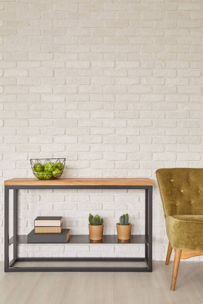 istock Wooden table with plants and wire basket 836568182