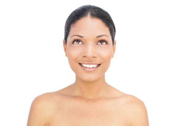 istock Smiling black haired woman posing 836568538