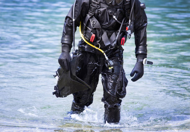 istock Scuba diver entering lake 836568592