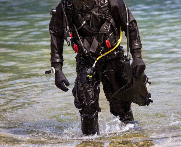 istock Scuba diver entering lake 836568788