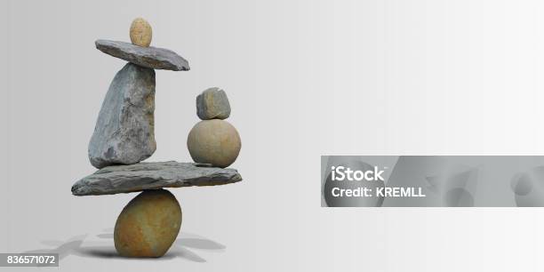 Land Art In Balancing Stones Stock Photo - Download Image Now - Balance, Performance, Supported