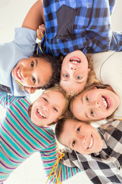 istock Children touching their heads 836578310