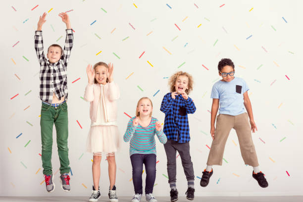 istock Children smiling and jumping 836578374