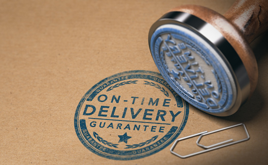 Rubber stamp and on-time delivery guarantee mark on carton box, 3D illustration
