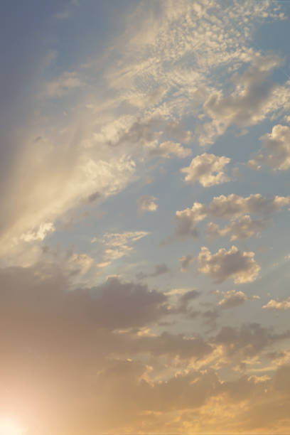 istock Bright yellow and grey clouds at sunset or sunrise 836582986