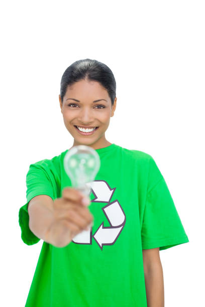 istock Smiling model wearing recycling tshirt holding light bulb 836587106