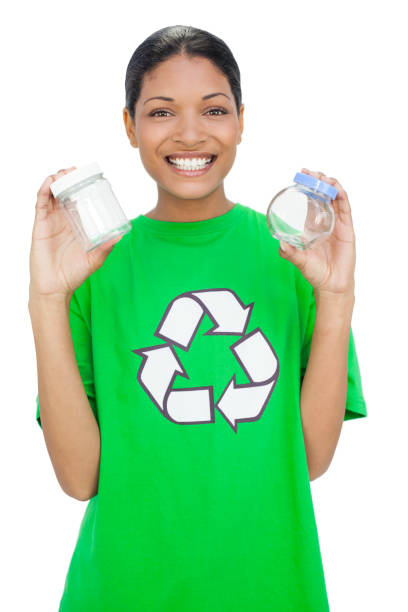 istock Cheerful model wearing recycling tshirt holding pots 836587154