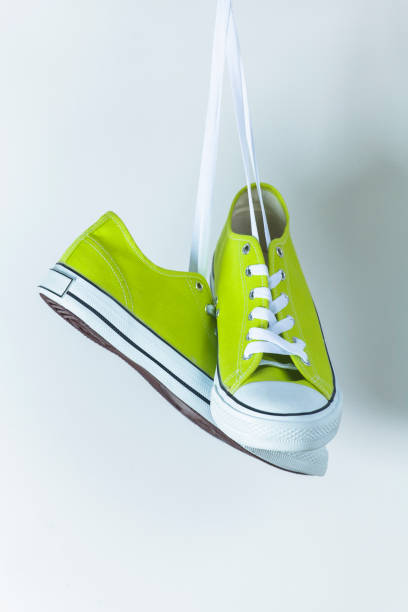 istock Pair of new green sneakers 836589242