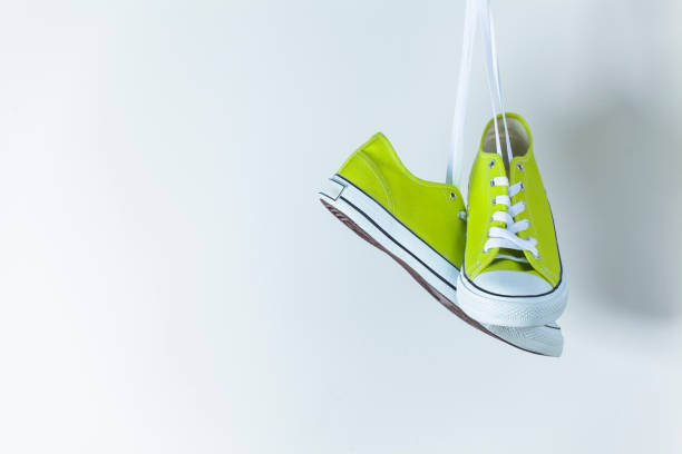 istock Pair of new green sneakers 836589360