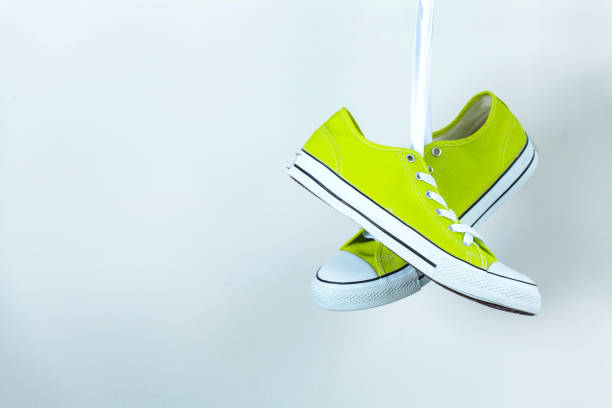 istock Pair of new green sneakers 836589372