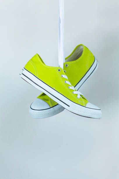 istock Pair of new green sneakers 836589408