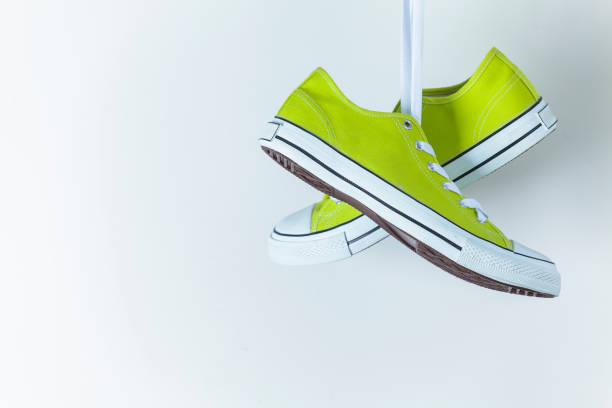 istock Pair of new green sneakers 836589522