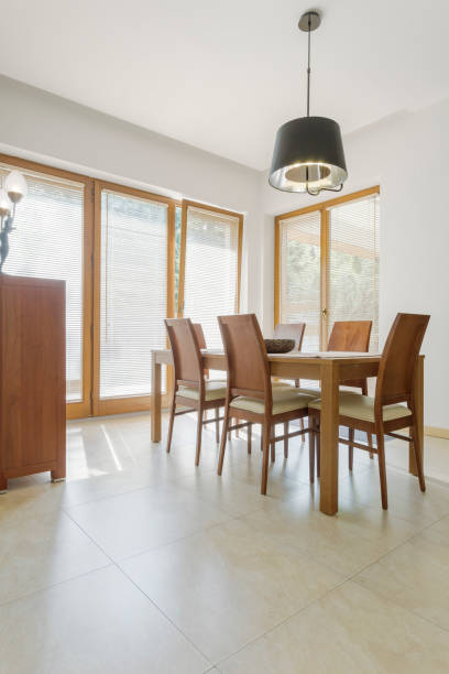 istock Dining area with wooden table 836597884