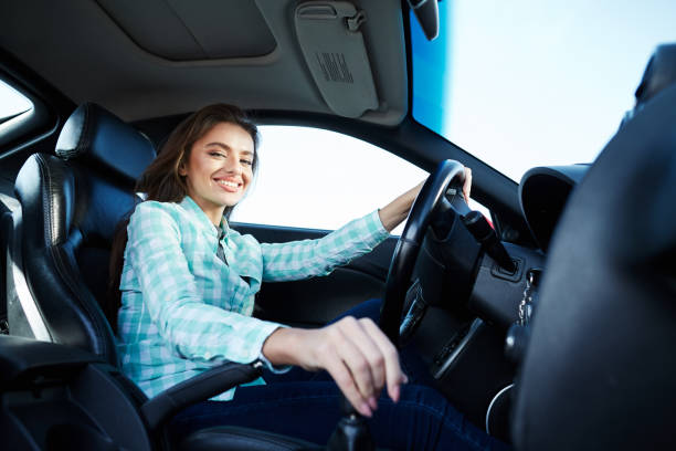 istock Attractive girl driving the car 836597908