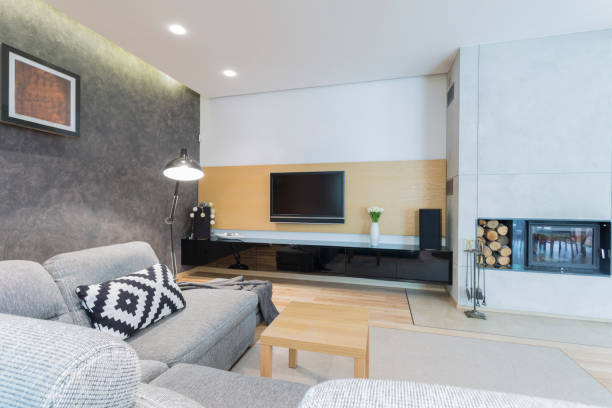 istock Living room with TV and fireplace 836597934