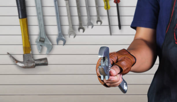 istock Cropped view of Hand with wrench 836599274