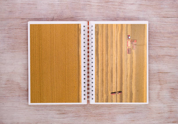 istock Agricultural scenes on pages of notebook 836601902