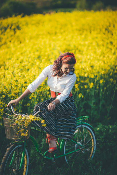 istock Vintage girl with bike 836603076