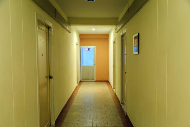 Hotel corridorh to the fire exit door in the hotel.